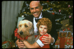 Bridget Walsh as Annie and Rhodes Reason as Daddy Warbucks w. Sandy in a scene from a touring company of the musical "Annie." (Fort Worth)