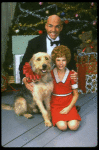 Bridget Walsh as Annie and Rhodes Reason as Daddy Warbucks w. Sandy in a scene from a touring company of the musical "Annie." (Fort Worth)