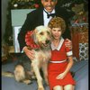 Bridget Walsh as Annie and Rhodes Reason as Daddy Warbucks w. Sandy in a scene from a touring company of the musical "Annie." (Fort Worth)