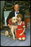 Bridget Walsh as Annie and Rhodes Reason as Daddy Warbucks w. Sandy in a scene from a touring company of the musical "Annie." (Fort Worth)