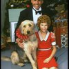 Bridget Walsh as Annie and Rhodes Reason as Daddy Warbucks w. Sandy in a scene from a touring company of the musical "Annie." (Fort Worth)