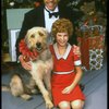 Bridget Walsh as Annie and Rhodes Reason as Daddy Warbucks w. Sandy in a scene from a touring company of the musical "Annie." (Fort Worth)