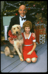 Bridget Walsh as Annie and Rhodes Reason as Daddy Warbucks w. Sandy in a scene from a touring company of the musical "Annie." (Fort Worth)