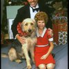 Bridget Walsh as Annie and Rhodes Reason as Daddy Warbucks w. Sandy in a scene from a touring company of the musical "Annie." (Fort Worth)