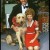 Bridget Walsh as Annie and Rhodes Reason as Daddy Warbucks w. Sandy in a scene from a touring company of the musical "Annie." (Fort Worth)