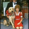 Bridget Walsh as Annie and Rhodes Reason as Daddy Warbucks w. Sandy in a scene from a touring company of the musical "Annie." (Fort Worth)