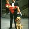 Bridget Walsh as Annie and Rhodes Reason as Daddy Warbucks w. Sandy in a scene from a touring company of the musical "Annie." (Fort Worth)