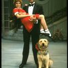 Bridget Walsh as Annie and Rhodes Reason as Daddy Warbucks w. Sandy in a scene from a touring company of the musical "Annie." (Fort Worth)