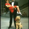 Bridget Walsh as Annie and Rhodes Reason as Daddy Warbucks w. Sandy in a scene from a touring company of the musical "Annie." (Fort Worth)