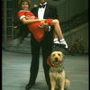 Bridget Walsh as Annie and Rhodes Reason as Daddy Warbucks w. Sandy in a scene from a touring company of the musical "Annie." (Fort Worth)