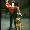 Bridget Walsh as Annie and Rhodes Reason as Daddy Warbucks w. Sandy in a scene from a touring company of the musical "Annie." (Fort Worth)