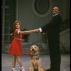 Bridget Walsh as Annie and Rhodes Reason as Daddy Warbucks w. Sandy in a scene from a touring company of the musical "Annie." (Fort Worth)