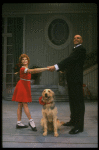 Bridget Walsh as Annie and Rhodes Reason as Daddy Warbucks w. Sandy in a scene from a touring company of the musical "Annie." (Fort Worth)