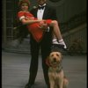 Bridget Walsh as Annie and Rhodes Reason as Daddy Warbucks w. Sandy in a scene from a touring company of the musical "Annie." (Fort Worth)