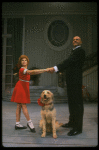 Bridget Walsh as Annie and Rhodes Reason as Daddy Warbucks w. Sandy in a scene from a touring company of the musical "Annie." (Fort Worth)