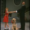 Bridget Walsh as Annie and Rhodes Reason as Daddy Warbucks w. Sandy in a scene from a touring company of the musical "Annie." (Fort Worth)