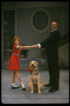 Bridget Walsh as Annie and Rhodes Reason as Daddy Warbucks w. Sandy in a scene from a touring company of the musical "Annie." (Fort Worth)