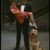 Bridget Walsh as Annie and Rhodes Reason as Daddy Warbucks w. Sandy in a scene from a touring company of the musical "Annie." (Fort Worth)