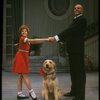 Bridget Walsh as Annie and Rhodes Reason as Daddy Warbucks w. Sandy in a scene from a touring company of the musical "Annie." (Fort Worth)