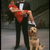 Bridget Walsh as Annie and Rhodes Reason as Daddy Warbucks w. Sandy in a scene from a touring company of the musical "Annie." (Fort Worth)