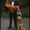 Bridget Walsh as Annie and Rhodes Reason as Daddy Warbucks w. Sandy in a scene from a touring company of the musical "Annie." (Fort Worth)