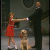 Bridget Walsh as Annie and Rhodes Reason as Daddy Warbucks w. Sandy in a scene from a touring company of the musical "Annie." (Fort Worth)