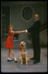 Bridget Walsh as Annie and Rhodes Reason as Daddy Warbucks w. Sandy in a scene from a touring company of the musical "Annie." (Fort Worth)