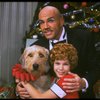 Bridget Walsh as Annie and Rhodes Reason as Daddy Warbucks w. Sandy in a scene from a touring company of the musical "Annie." (Fort Worth)