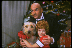 Bridget Walsh as Annie and Rhodes Reason as Daddy Warbucks w. Sandy in a scene from a touring company of the musical "Annie." (Fort Worth)