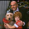 Bridget Walsh as Annie and Rhodes Reason as Daddy Warbucks w. Sandy in a scene from a touring company of the musical "Annie." (Fort Worth)
