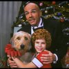 Bridget Walsh as Annie and Rhodes Reason as Daddy Warbucks w. Sandy in a scene from a touring company of the musical "Annie." (Fort Worth)