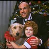 Bridget Walsh as Annie and Rhodes Reason as Daddy Warbucks w. Sandy in a scene from a touring company of the musical "Annie." (Fort Worth)