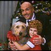 Bridget Walsh as Annie and Rhodes Reason as Daddy Warbucks w. Sandy in a scene from a touring company of the musical "Annie." (Fort Worth)