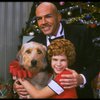 Bridget Walsh as Annie and Rhodes Reason as Daddy Warbucks w. Sandy in a scene from a touring company of the musical "Annie." (Fort Worth)