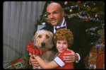 Bridget Walsh as Annie and Rhodes Reason as Daddy Warbucks w. Sandy in a scene from a touring company of the musical "Annie." (Fort Worth)
