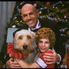 Bridget Walsh as Annie and Rhodes Reason as Daddy Warbucks w. Sandy in a scene from a touring company of the musical "Annie." (Fort Worth)