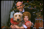 Bridget Walsh as Annie and Rhodes Reason as Daddy Warbucks w. Sandy in a scene from a touring company of the musical "Annie." (Fort Worth)