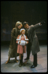 Bridget Walsh as Annie, Rhodes Reason as Daddy Warbucks and Lauren Mitchell as Grace in a scene from a touring company of the musical "Annie." (Fort Worth)