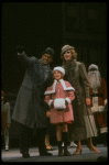 Bridget Walsh as Annie, Rhodes Reason as Daddy Warbucks and Lauren Mitchell as Grace in a scene from a touring company of the musical "Annie." (Fort Worth)