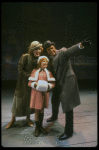 Bridget Walsh as Annie, Rhodes Reason as Daddy Warbucks and Lauren Mitchell as Grace in a scene from a touring company of the musical "Annie." (Fort Worth)