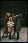 Bridget Walsh as Annie, Rhodes Reason as Daddy Warbucks and Lauren Mitchell as Grace in a scene from a touring company of the musical "Annie." (Fort Worth)