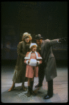 Bridget Walsh as Annie, Rhodes Reason as Daddy Warbucks and Lauren Mitchell as Grace in a scene from a touring company of the musical "Annie." (Fort Worth)