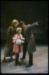 Bridget Walsh as Annie, Rhodes Reason as Daddy Warbucks and Lauren Mitchell as Grace in a scene from a touring company of the musical "Annie." (Fort Worth)