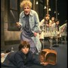 Ruth Kobart as Miss Hannigan and Louanne as Annie w. orphans in a scene from a touring company of the musical "Annie." (Boston)