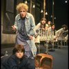 Ruth Kobart as Miss Hannigan and Louanne as Annie w. orphans in a scene from a touring company of the musical "Annie." (Boston)