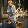 Ruth Kobart as Miss Hannigan and Louanne as Annie w. orphans in a scene from a touring company of the musical "Annie." (Boston)
