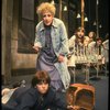 Ruth Kobart as Miss Hannigan and Louanne as Annie w. orphans in a scene from a touring company of the musical "Annie." (Boston)