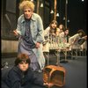 Ruth Kobart as Miss Hannigan and Louanne as Annie w. orphans in a scene from a touring company of the musical "Annie." (Boston)