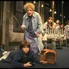 Ruth Kobart as Miss Hannigan and Louanne as Annie w. orphans in a scene from a touring company of the musical "Annie." (Boston)