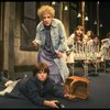 Ruth Kobart as Miss Hannigan and Louanne as Annie w. orphans in a scene from a touring company of the musical "Annie." (Boston)